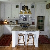 Painted white maple kitchen with granite counter tops.